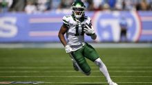 Jets WR Cooper, safety Fitzpatrick both hurt against Titans