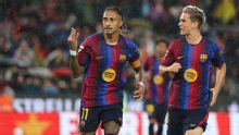 Barcelona net 7 in rout of promoted Racing Santander