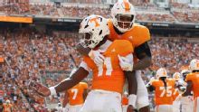 Tennessee and Texas battle for UT rights, SEC orange, Manning loyalty