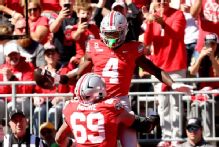 Smith's historic 200-yard, 4 TD game propels Ohio State