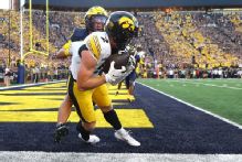 No. 17 Iowa downs No. 18 Michigan with last-second TD pass