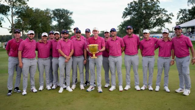 Captain Brandt Snedeker holds the trophy with his team after their Presidents Cup win.
