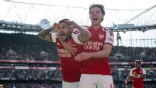 Arsenal fight back to win as Premier League resumes under cloud of Man City verdict