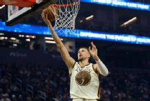 Warriors' Kristaps Porzingis remains out indefinitely but will be around team