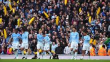 Man City fans' inflatable banana craze sweeps defiant Etihad