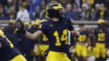 Michigan's Whittingham: Won't 'tip our hand' by naming starting QB vs. Indiana