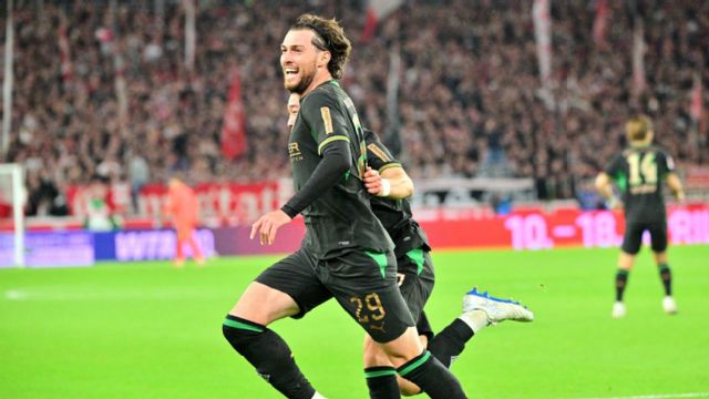 Joe Scally celebrates his equalizer for Gladbach against Stuttgart.