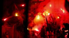 Lens fans banned from Liverpool match for throwing flares vs. Brugge