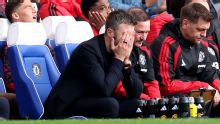 Pressure piles on Michael Carrick as 10-man Man United lose at Chelsea