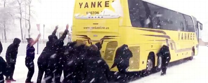 Northeastern women's basketball team pushes bus out of snow