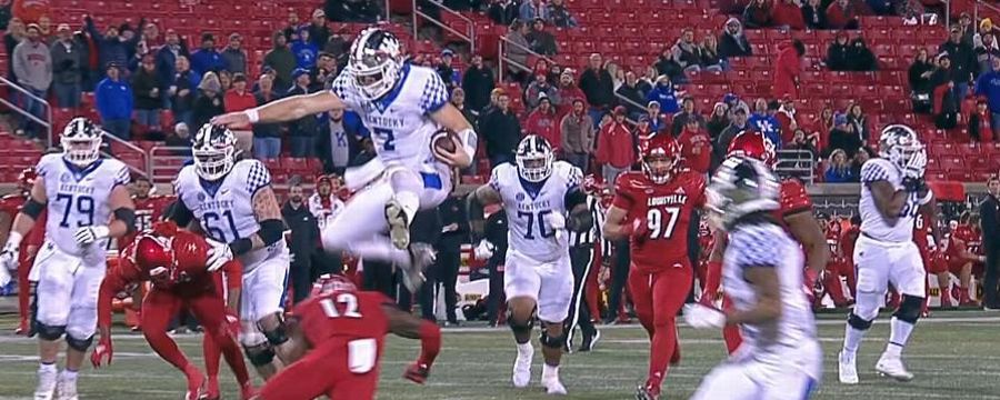 Kentucky QB makes Louisville defense look silly with spin and hurdle