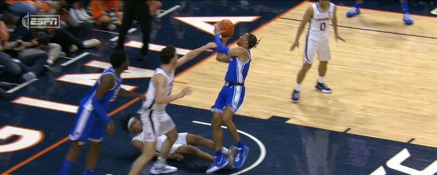 Wendell Moore Jr. goes through a defender for a bucket