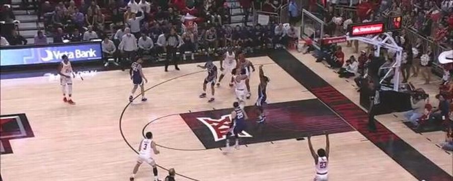 Adonis Arms gets the rebound and delivers the two-handed jam