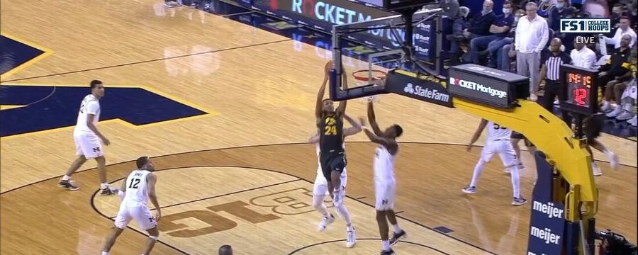Murray brothers combine for 42 points vs. Michigan