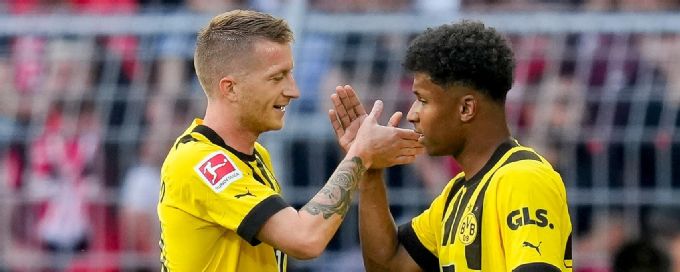 Marco Reus lifts Dortmund to first win of season