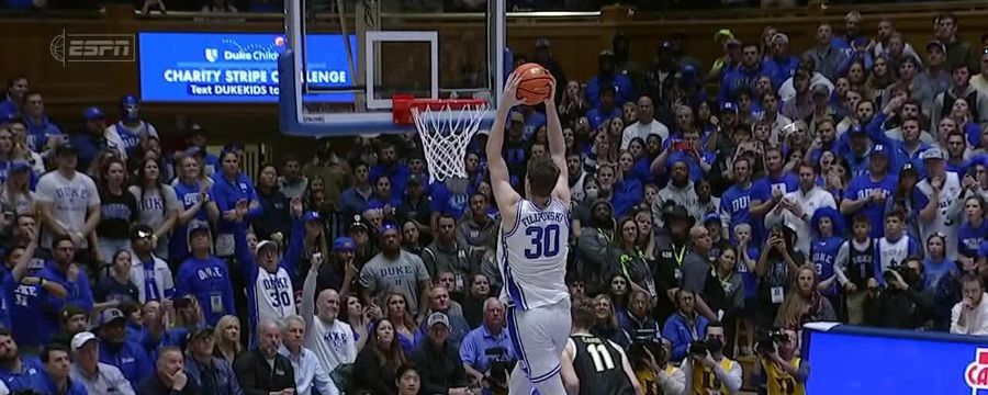 Kyle Filipowski throws down the dunk to boost Duke's lead