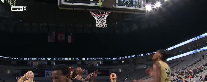 Jane Asinde somehow gets the and-1 to fall