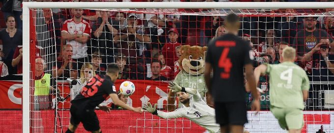 Leverkusen earns draw after stoppage-time penalty