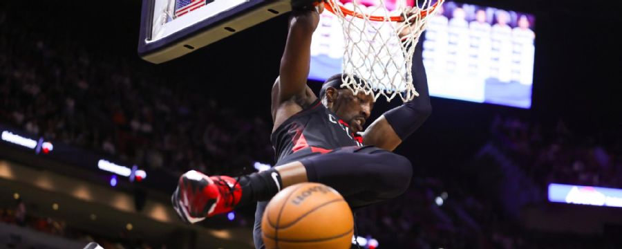 Bam Adebayo rises high for this alley-oop slam