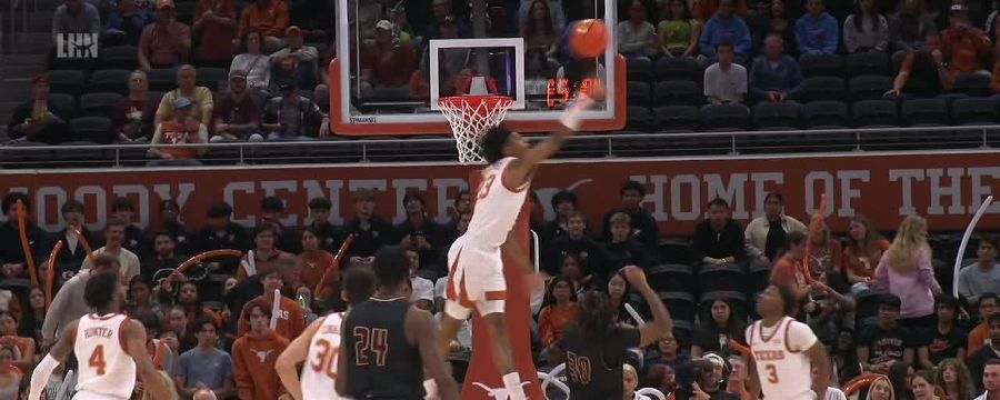 Dillon Mitchell with a massive block for Texas