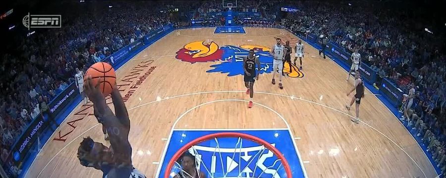 K.J. Adams Jr. catches half-court lob for a Kansas dunk