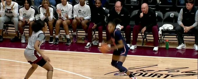 Anaya Brown scores and draws the foul