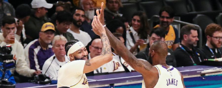LeBron lobs to AD for alley-oop slam