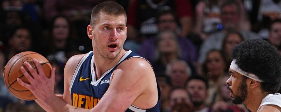 Jokic dazzles with pair of late dimes as Nuggets clinch playoff berth