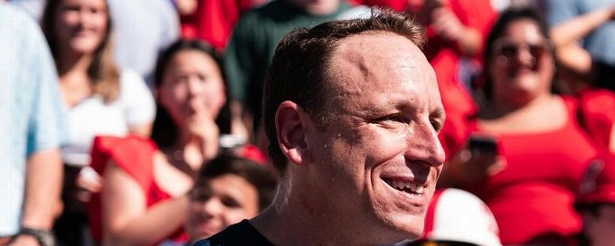 Joey Chestnut chows down in hot dog eating contest at Ole Miss spring game