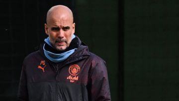 -Soccer-Man City boss Guardiola warns it is too soon to dream about double treble