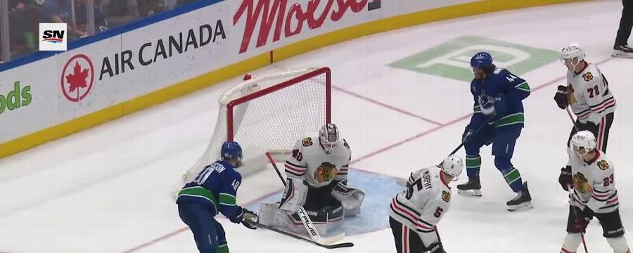 Erik Brannstrom lights the lamp for Canucks