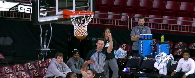 Andrea Daley scores and draws the foul