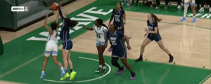 Malia Fisher rises to block the shot