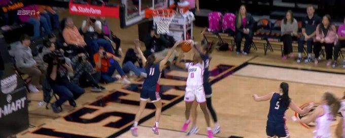 Bree Salenbien rises to block the shot