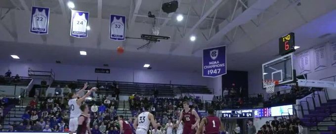 Max Green nails the triple to give Holy Cross the lead in OT