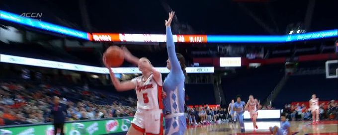 Blanca Thomas rises to block the shot