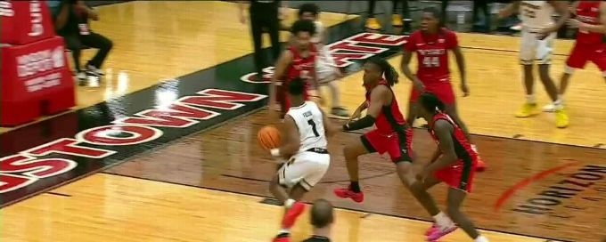 Themus Fulks somehow gets the and-1 to fall