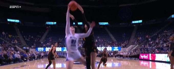 Kennedy Basham rises to block the shot