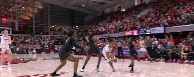 Zamareya Jones gets the and-1 for the Wolfpack