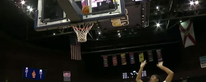 Daniela Gonzalez scores and draws the foul