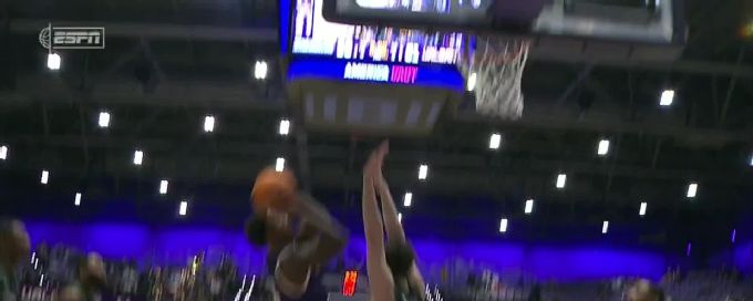 Kheni Briggs fights off defender for and-1