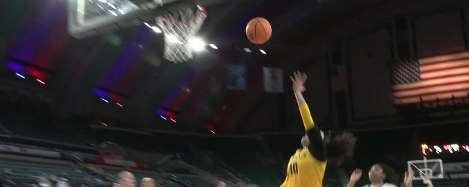 Paloma Garcia scores and draws the foul