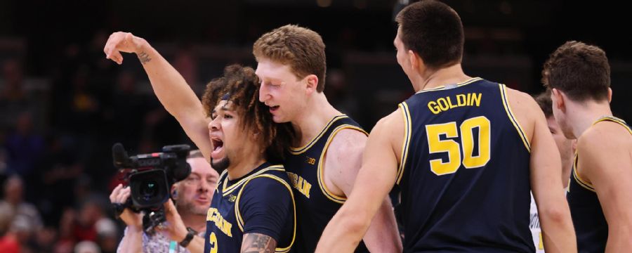Tre Donaldson takes it all the way to win it for Michigan late