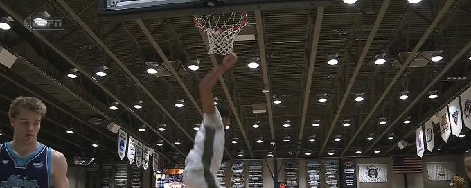 Kvonn Cramer rocks the rim with powerful slam dunk