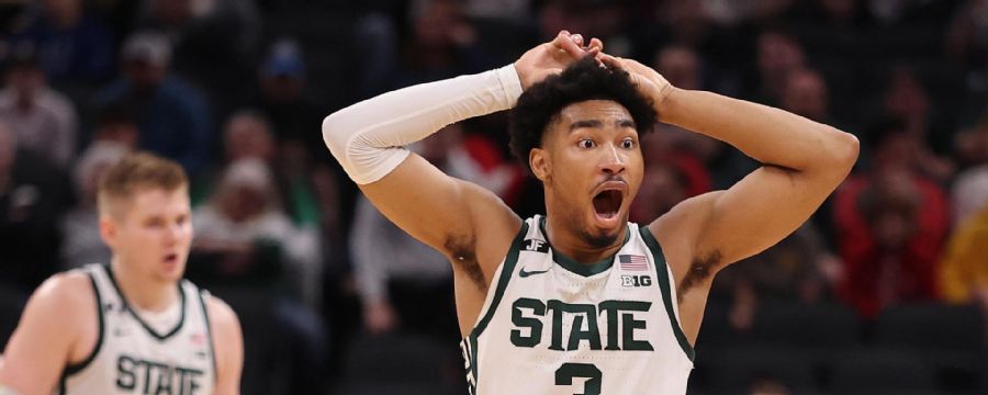 Wisconsin holds off Michigan State after no-foul call in Big Ten semis