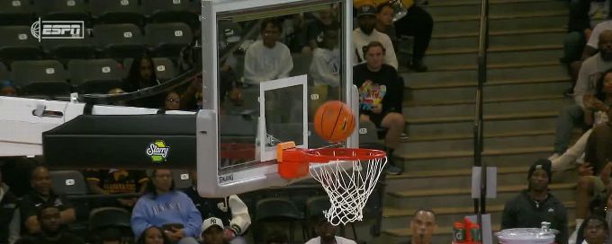 Shannon Grant gets the and-1 to fall