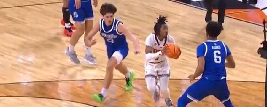 Texas Tech's Elijah Hawkins fakes a pass, then lays it in