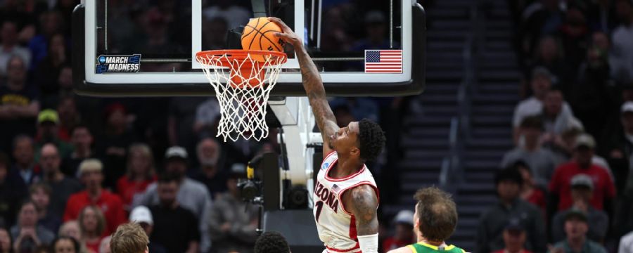 Caleb Love drives and slams with authority