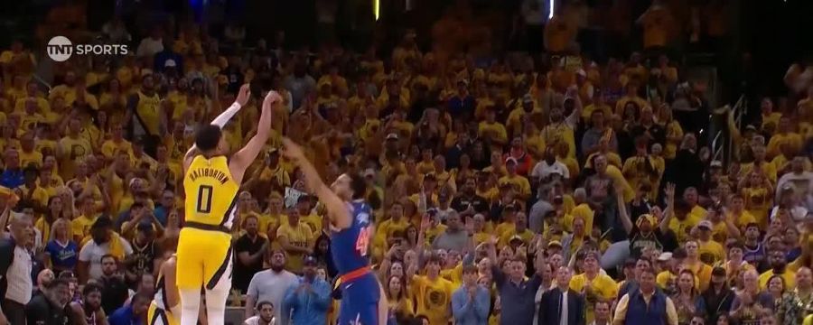 Tyrese Haliburton pulls up from the logo for a 3
