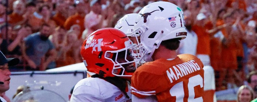 Arch Manning stands over defender after his rushing TD